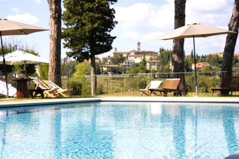 Seasonal outdoor pool, pool umbrellas, sun loungers