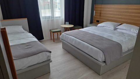 Standard Triple Room | Egyptian cotton sheets, premium bedding, Tempur-Pedic beds