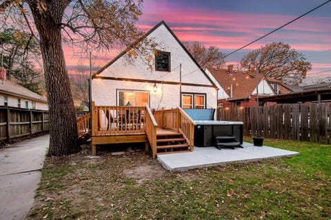 Deck and patio with spa and bistro lighting