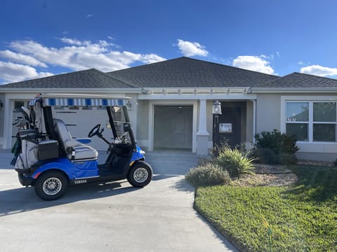 House with a golf cart