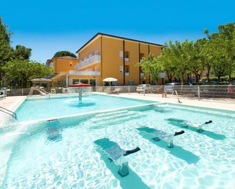 Outdoor pool, open 9:30 AM to 8:00 PM, pool umbrellas, sun loungers