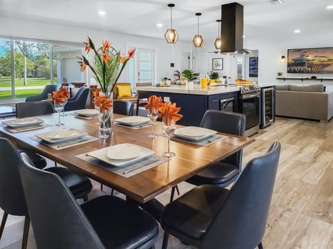 Gather eight at the dining table under smooth, modern lighting or take meals outside to al fresco dining, closer to outdoor ambiance of Florida's natural beauty.