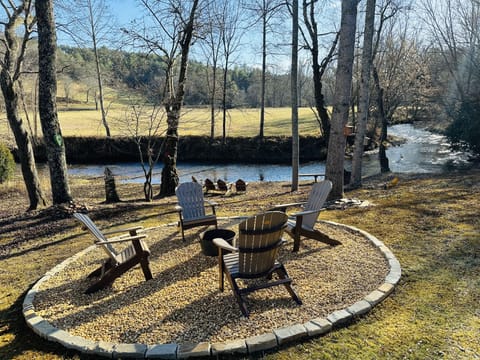 Enjoy relaxing by the fire pit along Hemptown Creek and soak in the views.