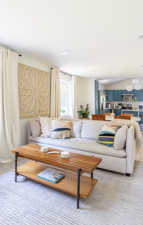 Open floor plan keeps everyone together. Kitchen, dining, and living room flow.