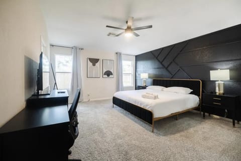 Oversized Primary Suite with Luxury King Bed.