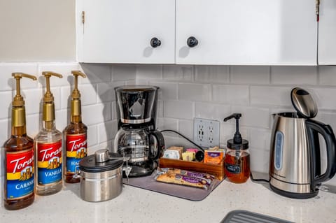 Coffee and tea bar with flavored syrups and fresh backyard honey 