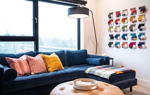 This corner unit features expansive mountain views