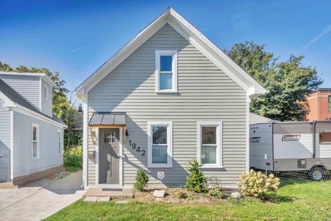 Cozy cottage-style exterior with modern updates and inviting curb appeal perfect for a comfortable and stylish stay.