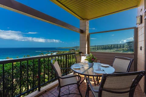 Picture yourself here, savoring morning coffee with endless ocean views and gentle breezes. Your private balcony awaits, perfectly set for peaceful moments above the palms.