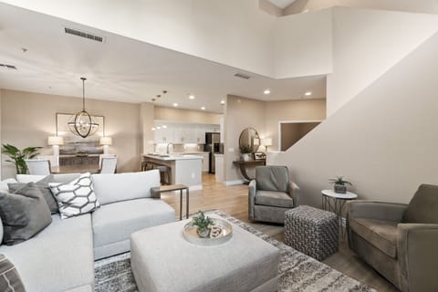Open, spacious main floor area with kitchen, dining, laundry, office and bath