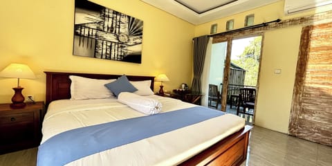 Deluxe Room Balcony with Jungle View | Desk, blackout drapes, free WiFi