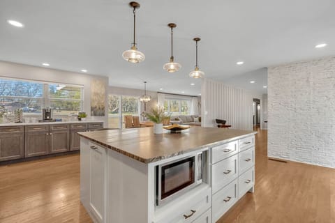 Beautiful remodeled kitchen with top end appliances, everything you need for cooking and the perfect setting for a family gathering