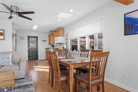 Dining Area: Gather around the dining table for a meal or enjoy a show on the TV in our open-concept living space.