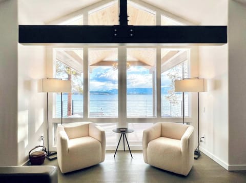 The perfect spot in the main living room to watch the sun rise or set. Also, eagles and osprey are known to fish out front. 