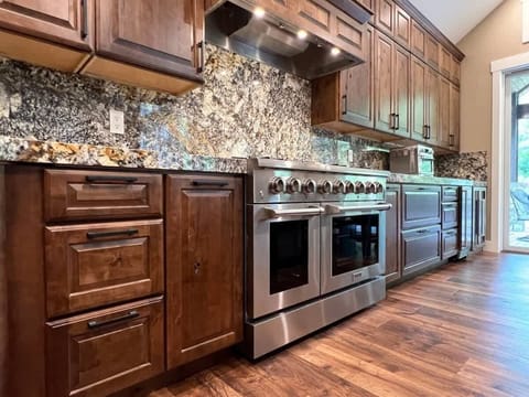 Beautiful Kitchen with six burner gas stove and double oven