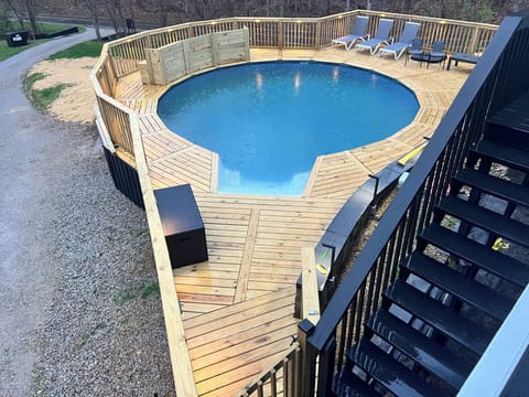 24' Heated round pool set up for all to enjoy. Plenty of seating with Grill/BBQ