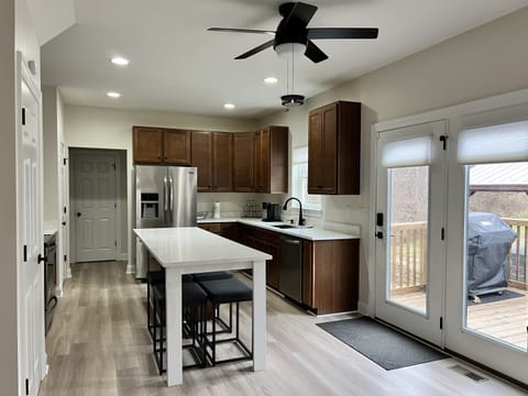 Main level complete kitchen with Quartz counter tops.