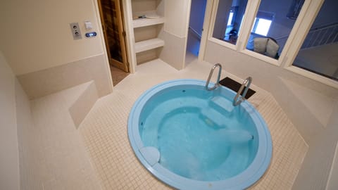 Indoor hot tub and sauna are warm and ready to help you relax.