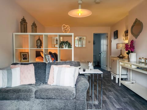 Standard Studio | Living area | 32-inch flat-screen TV with cable channels