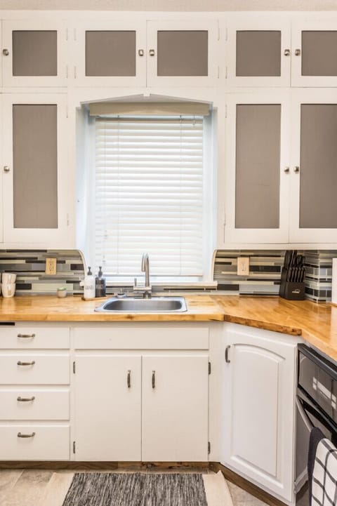 The kitchen is a well-equipped hub where culinary adventures await. From preparing delicious meals to brewing your favorite cup of coffee with the convenient coffee maker, this kitchen offers both functionality and convenience.