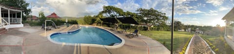 Outdoor pool, open 8:30 AM to 8:30 PM, pool umbrellas, sun loungers