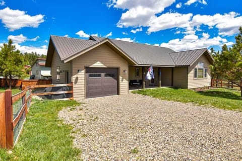 Front of house, parking infront of garage. 