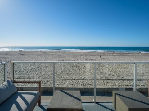 Enjoy this modern Outdoor space, featuring designer furniture—an ideal spot to sit back, relax, and take in the beautiful views.