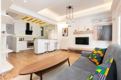Superior Apartment | Living area | 43-inch Smart TV with cable channels