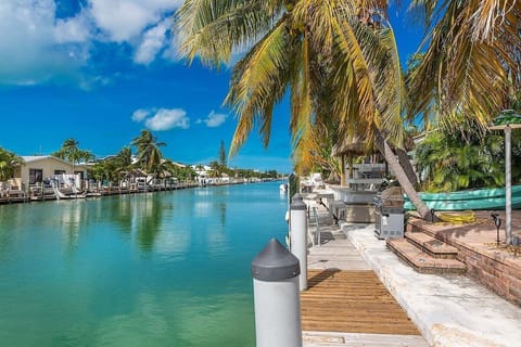 Enjoy peaceful water views and direct canal access from the private dock at this Key Colony Beach vacation rental.