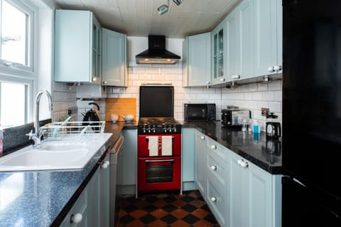 Fridge, electric kettle, toaster, cookware/dishes/utensils