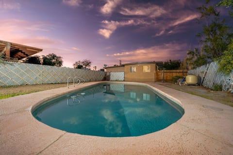 Pool (unheated) with seating (Note: The pool is shared with guests in the other unit in the duplex.)
