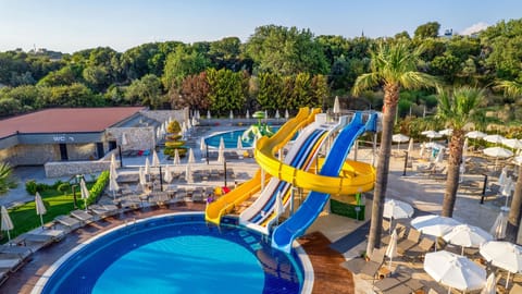 Indoor pool, seasonal outdoor pool, pool umbrellas, sun loungers