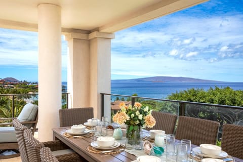 The table is set, the breeze is warm, and the view? A rolling masterpiece of blue that you’ll never stop admiring   