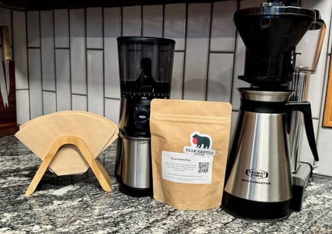 Moccamaster coffee maker, burr grinder, and a starter of local roast coffee!