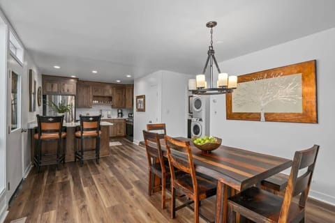 Dining Area: Gather around the dining table with views of the golf course just outside.