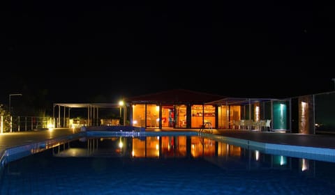 Outdoor pool, pool umbrellas, sun loungers