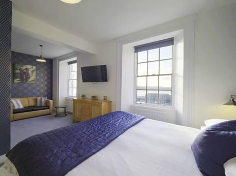 Family Room | Individually decorated, individually furnished, desk, free WiFi