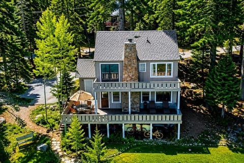 Beautiful lakefront retreat nestled among towering pines.