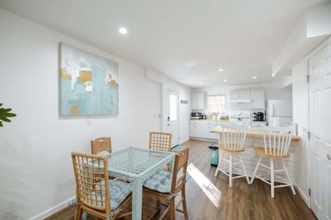 Open‑concept dining area designed for family meals, game nights, and coastal‑inspired gatherings.