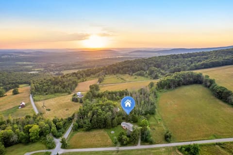 Watch the sun sink behind the ridgeline across 10 private acres that are entirely yours for the weekend, with no neighbors in sight—just mountains as far as you can see.