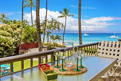 Sip your favorite beverage on your private balcony while soaking in breathtaking ocean views and watching the waves dance below.