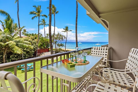Sip your favorite beverage on your private balcony while soaking in breathtaking ocean views and watching the waves dance below.
