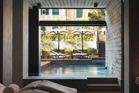 Indoor pool, outdoor pool, pool umbrellas, sun loungers