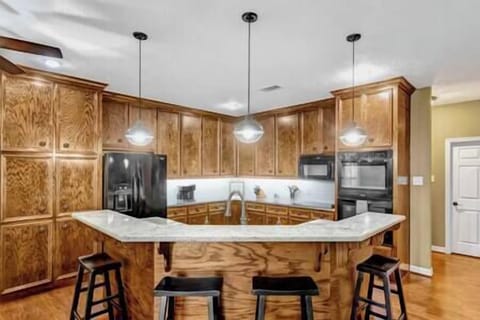 Spacious Wrap Around Kitchen Island for Dining and Entertaining