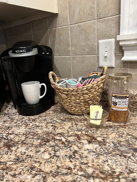 Coffee, tea, sugar, sugar alternative, creamer and honey provided.