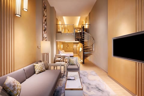 Family Suite, 1 King Bed, Balcony (Duplex) | Living area | 40-inch flat-screen TV with satellite channels, TV, iPod dock