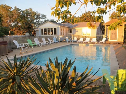Swim, play or relax by the huge 16' x 32' pool and hot tub steps from the door. 
