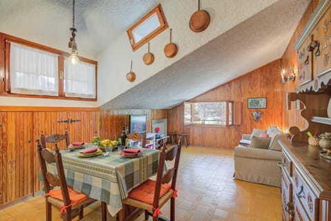 Family Apartment, Multiple Bedrooms (The Secret Garden) | Living area | 21-inch flat-screen TV with satellite channels