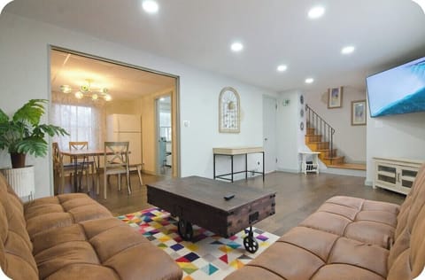Family/Living Area:
The heart of the house. Generous space for all to congregate. The couch doubles up as a bed for lazy binge watching or extra sleeping space.

Open access to dining and kitchen areas enable multiple activities and conversations.