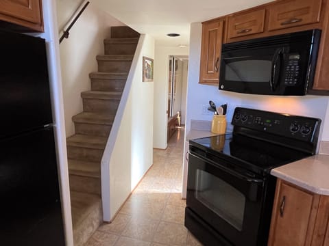 Kitchen and stairs to loft